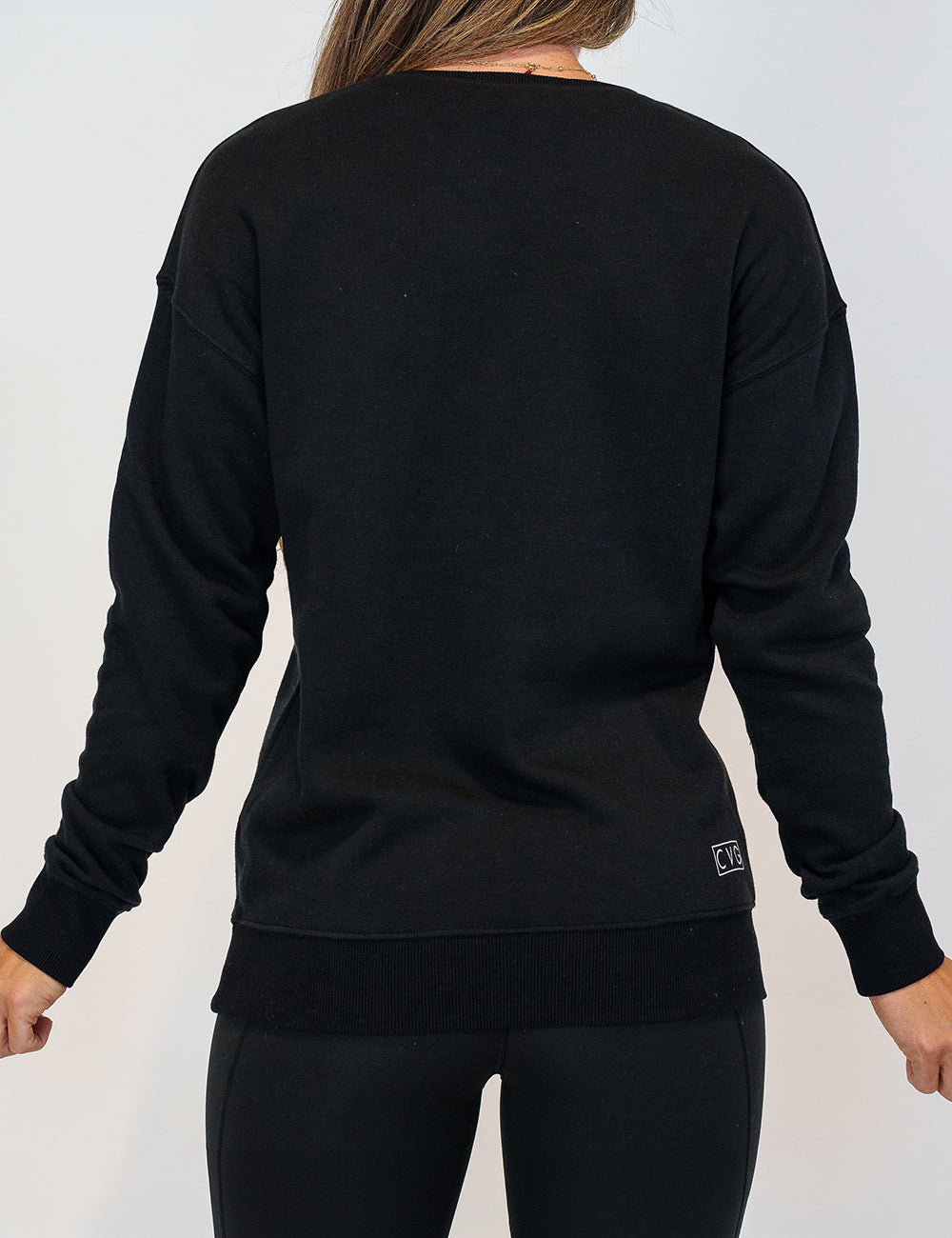 back of the front of the a basic black crewneck