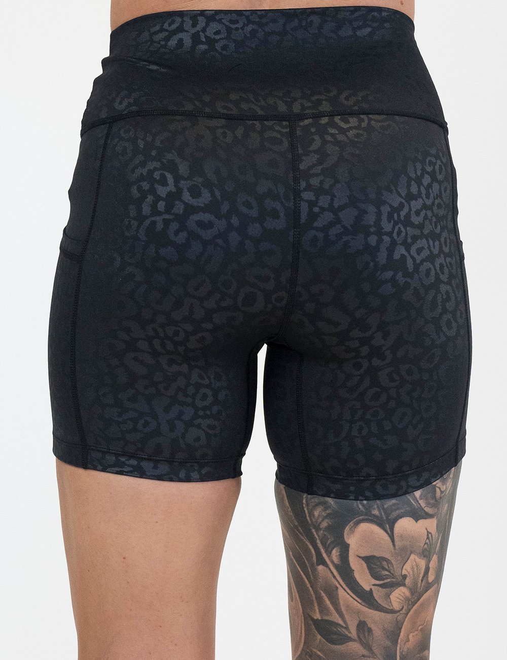 back of the 5 inch black leopard print shorts against a white background