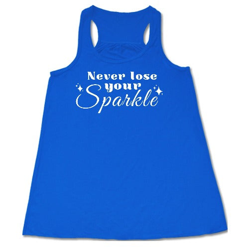 blue racerback shirt with the saying "Never Lose Your Sparkle" on it