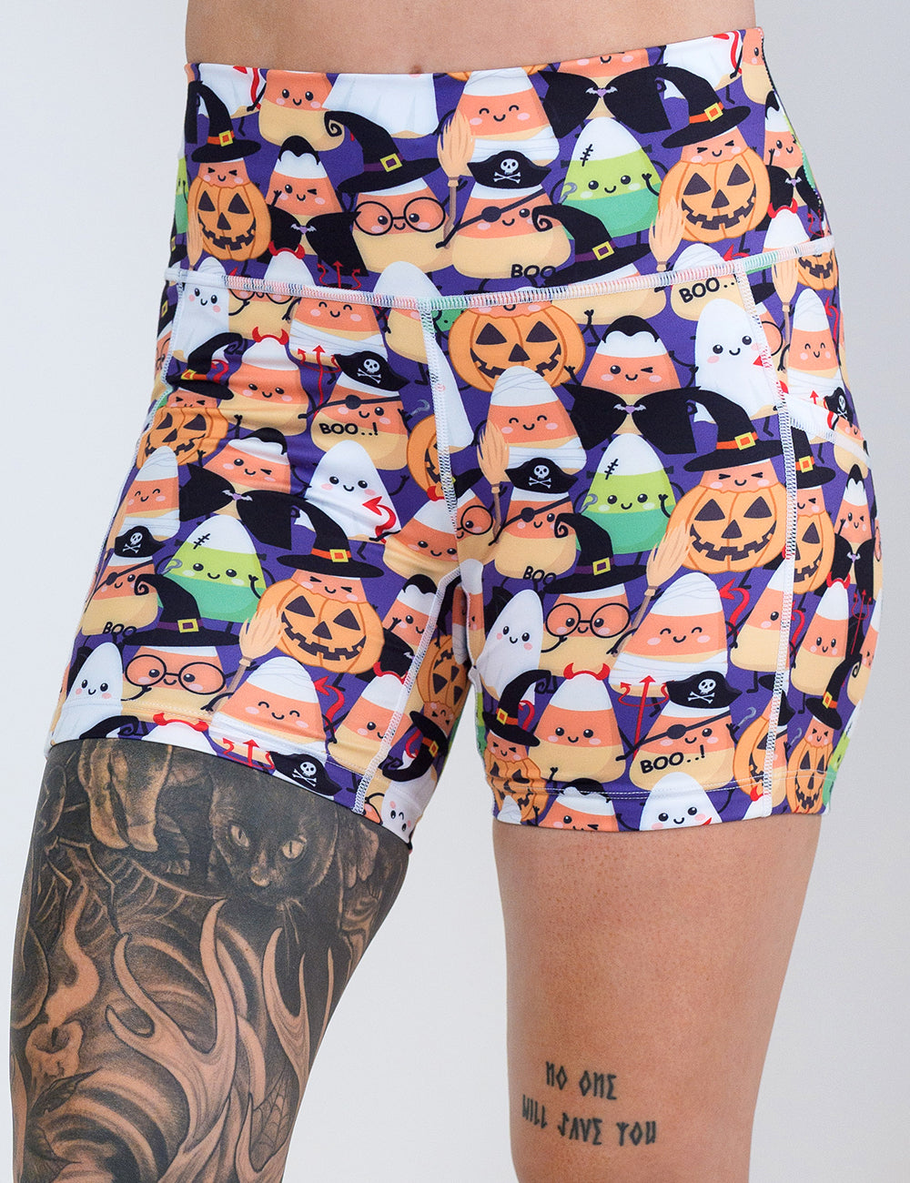 front of the 5 inch halloween candy corn patterned shorts against a white background