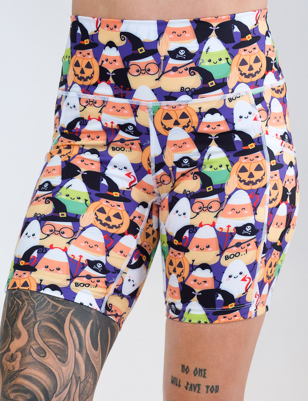 front of the 7 inch halloween candy corn patterned shorts against a white background