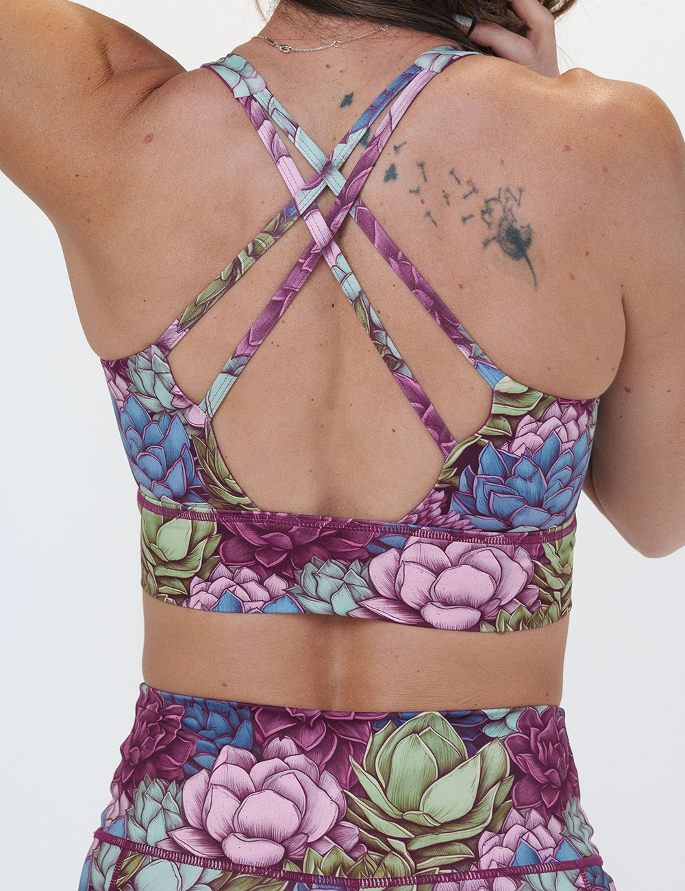 back of the succulent flowers longline bra against a white background