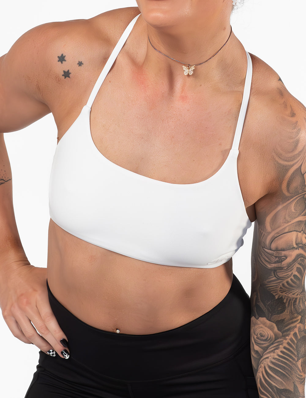 model wearing a solid white sports bra