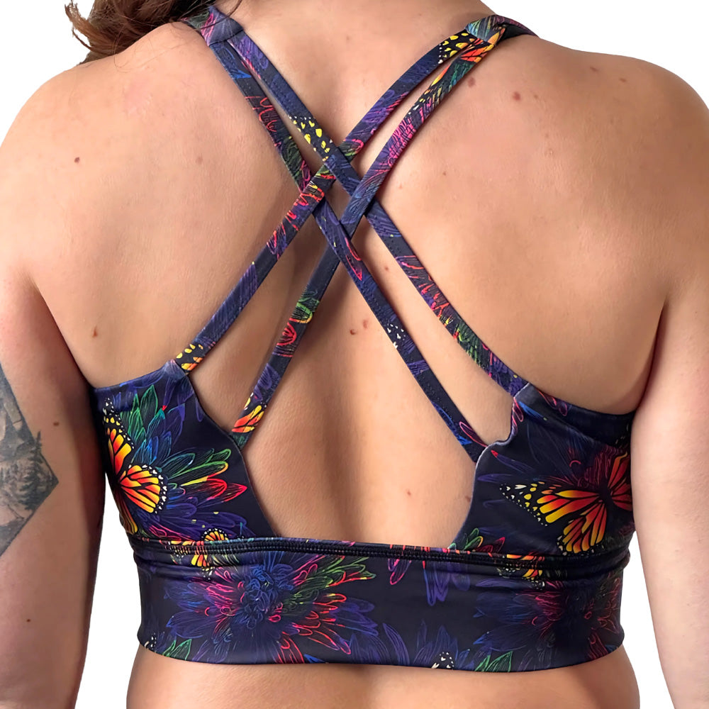 back of the colorful butterfly patterned sports bra