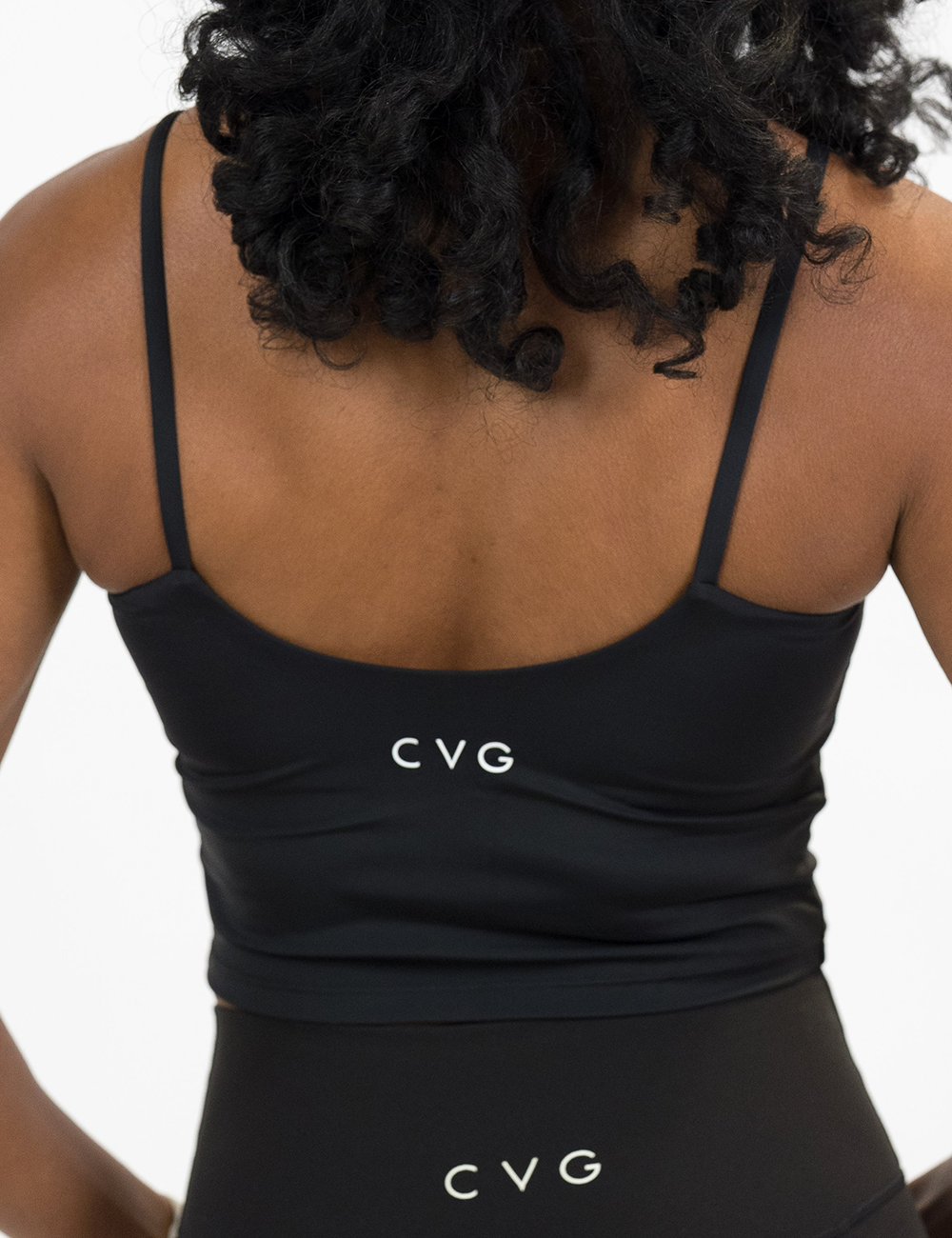 back of the black cami top against a white background