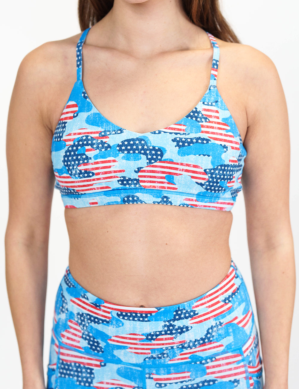front of the camo flag print bra against a white background