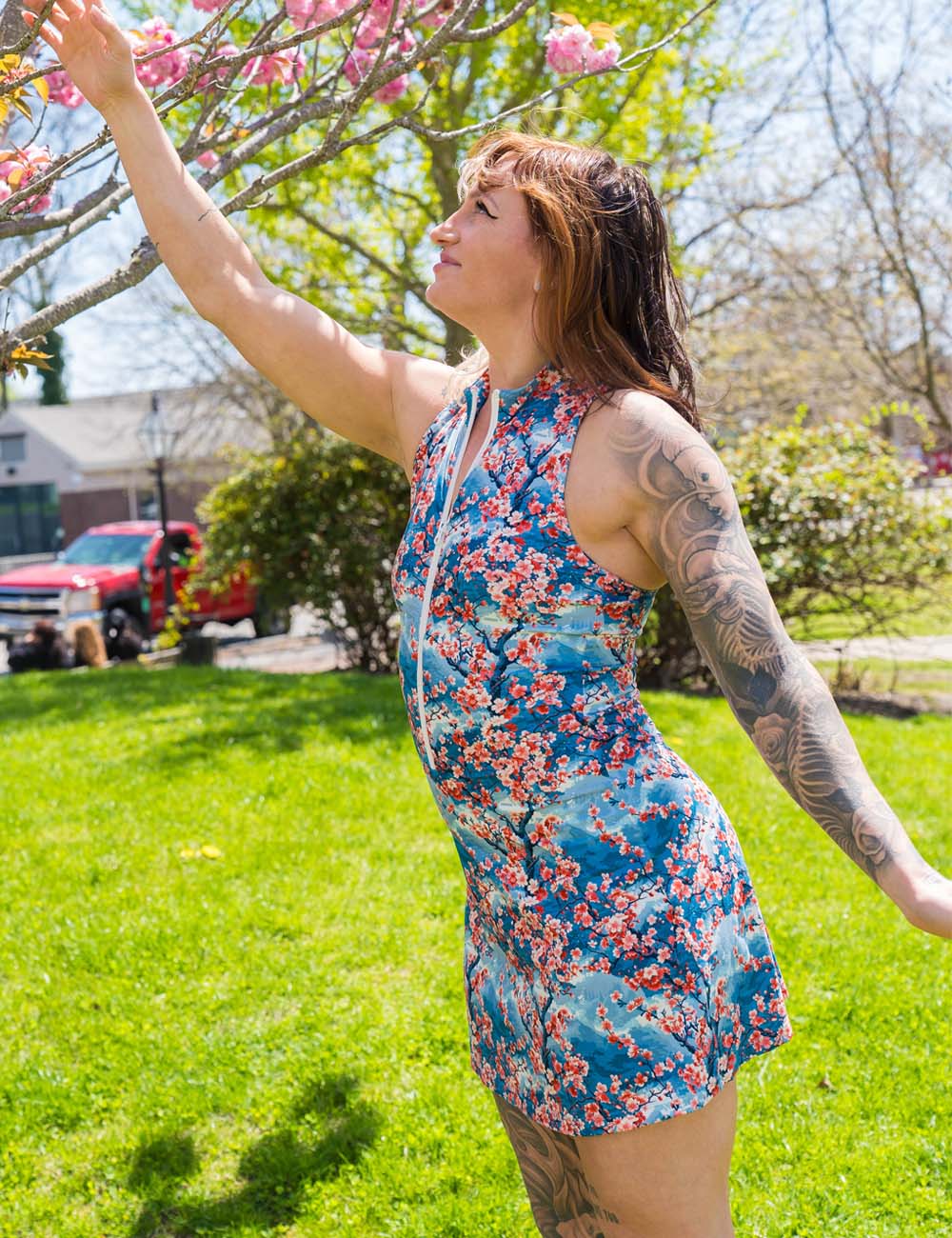 model wearing cherry blossom designed dress