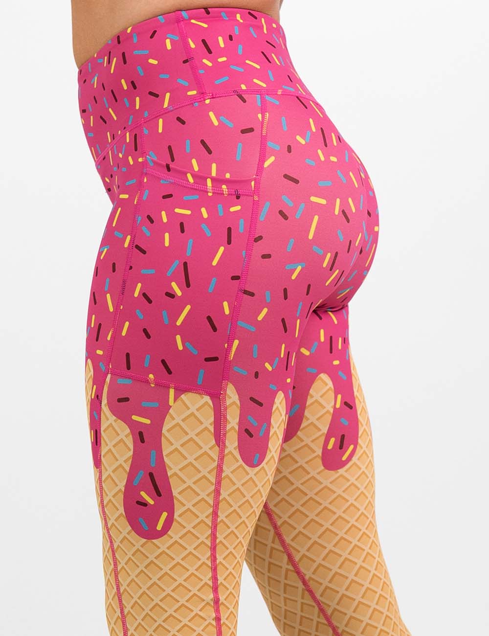 Ice cream leggings with pink sprinkle detailing at the top and a cone texture on the legs