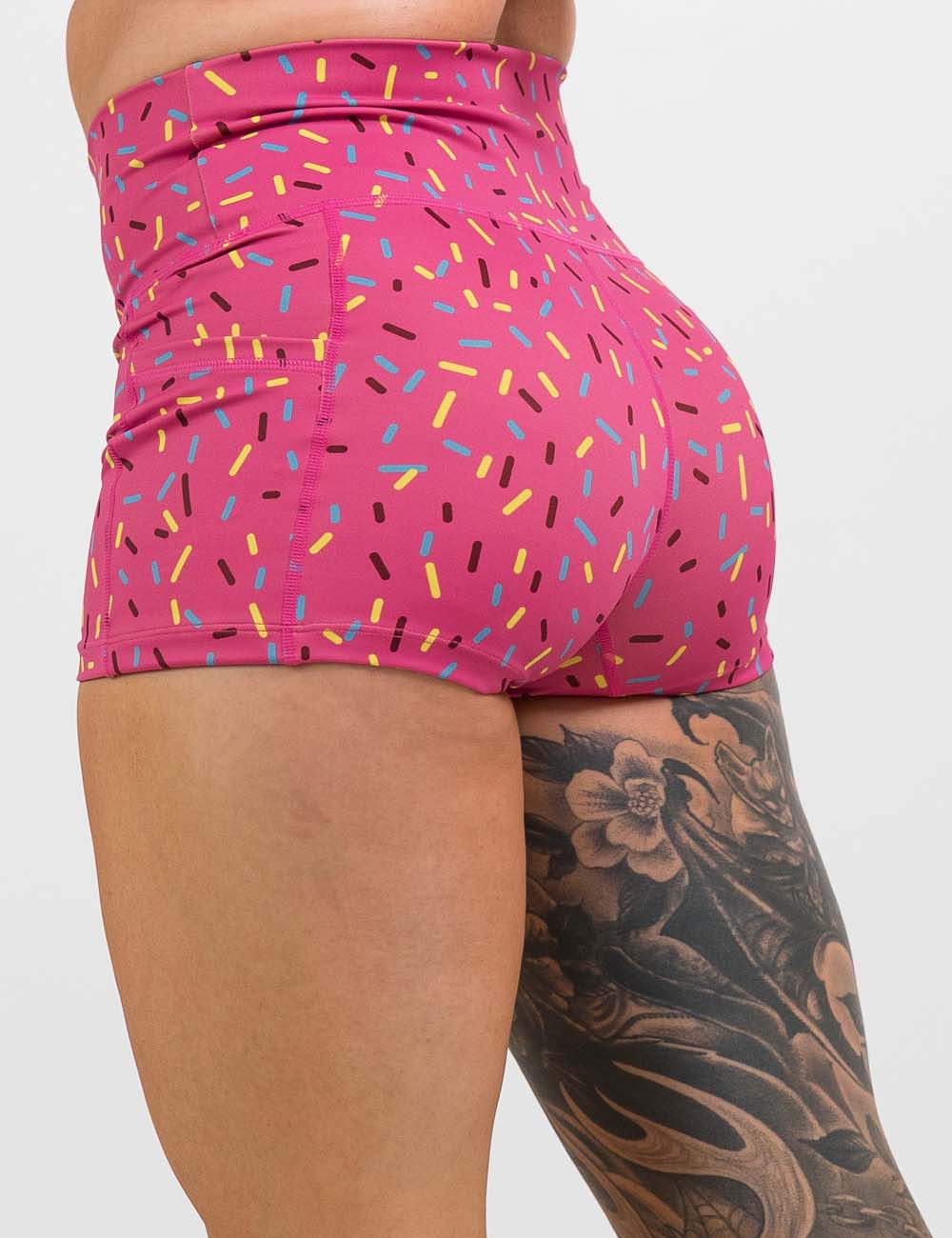 back of the 2.5 inch pink shorts with a sprinkles pattern against a white background