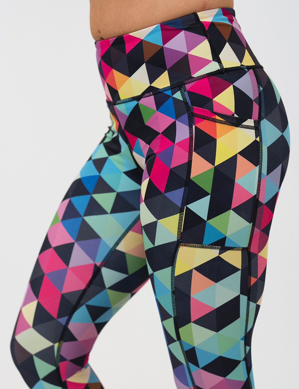color block leggings close up against a white background