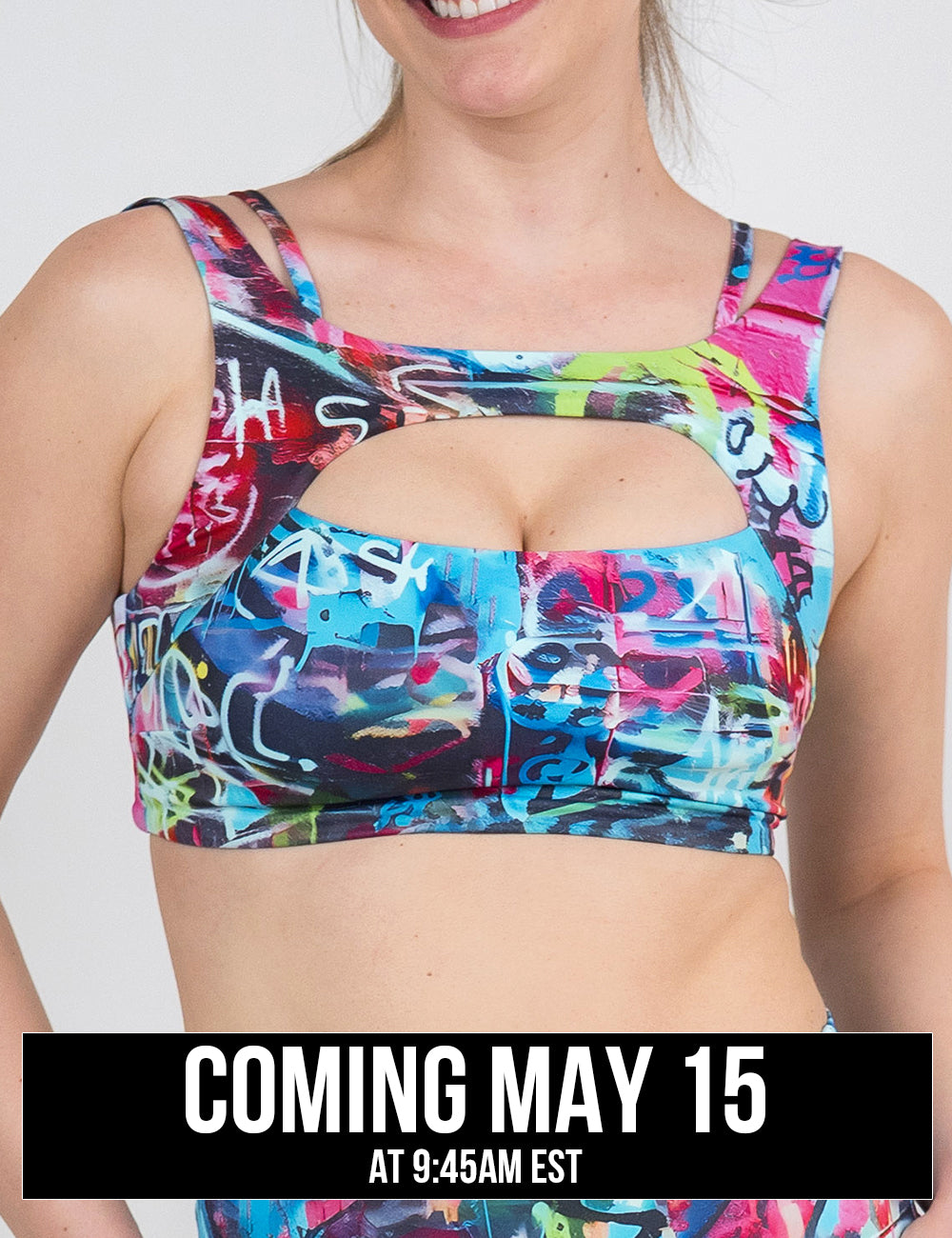 model wearing the multicolor graffiti vista bra against a white background coming may 15th