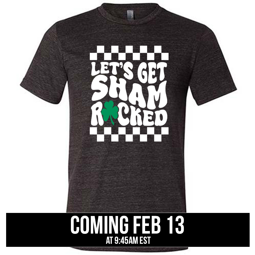 black unisex tee with the words "let's get shamrocked" on it, with a shamrock graphic replacing the "o" of "rocked", and a checkerboard border on top and bottom of the words, coming soon