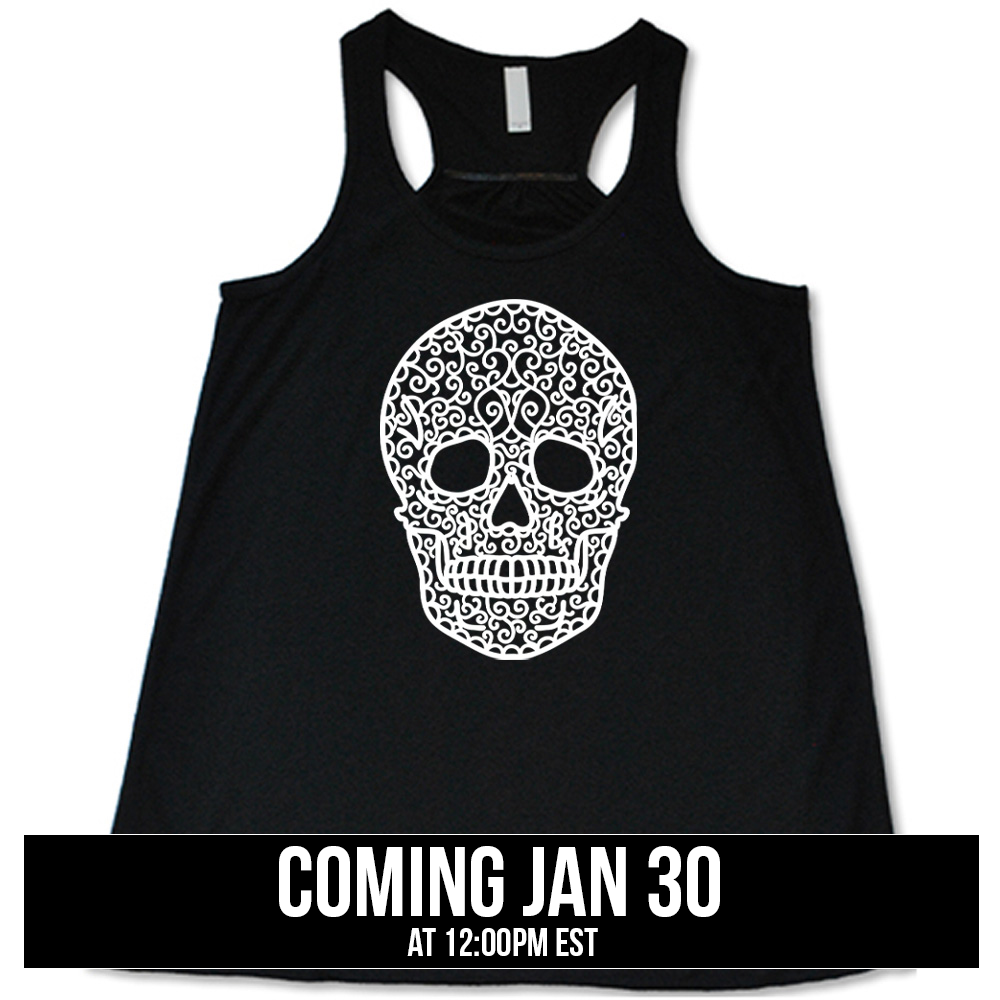 black flowy tank with the graphic of a large lacy skull, coming soon