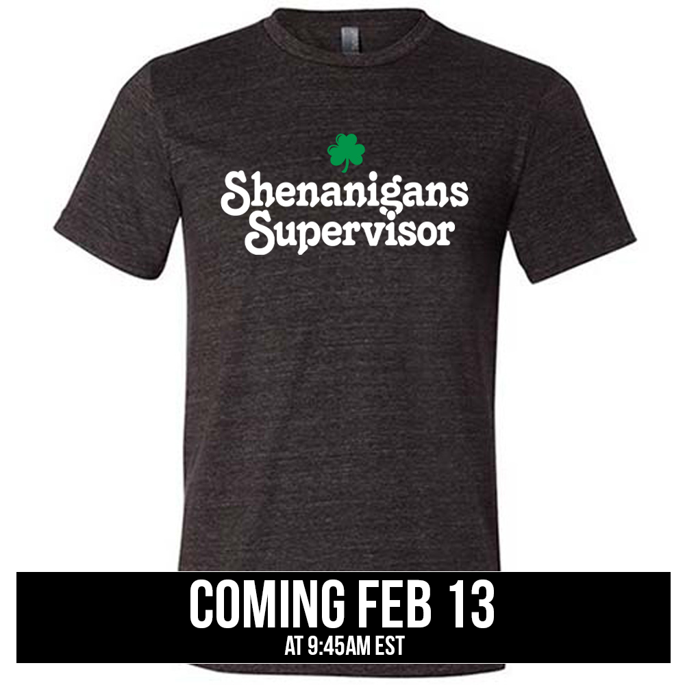 black unisex tee with the words "shenanigans supervisor" on it, with one small clover graphic above it, coming soon