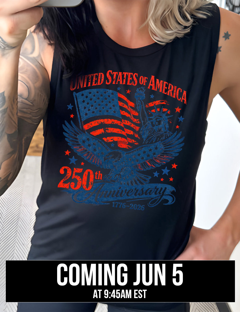 black muscle tank with the graphic of the eagle, wings spread, the statue of liberty, and an American flag, and lots of little stars, and the words saying "United Stated of America 250th Anniversary 1776-2026", coming june 5th