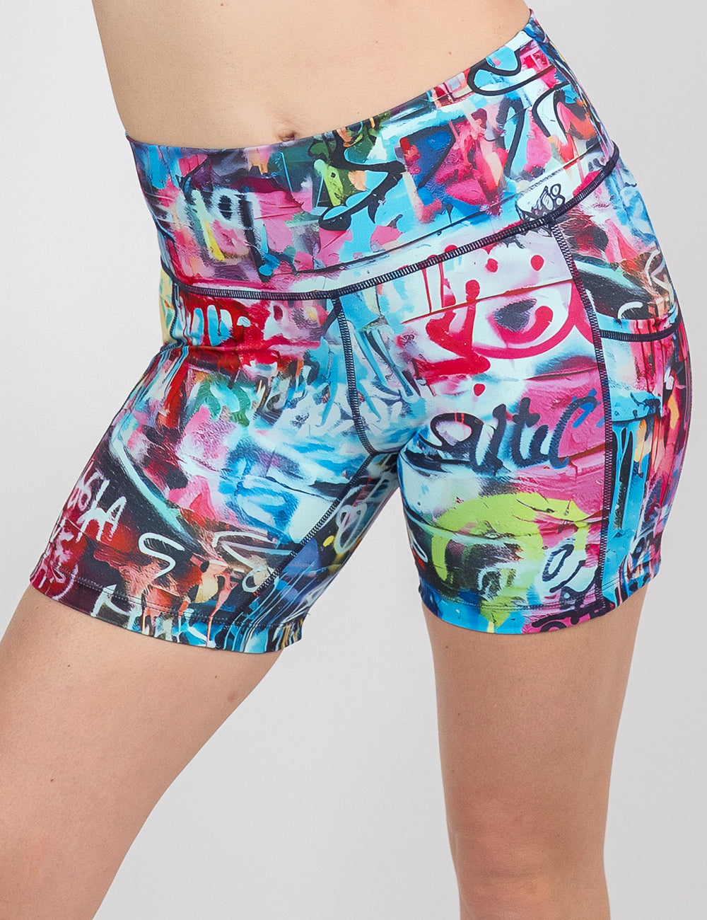front of the 5 inch multi colored graffiti pattern shorts against a white background