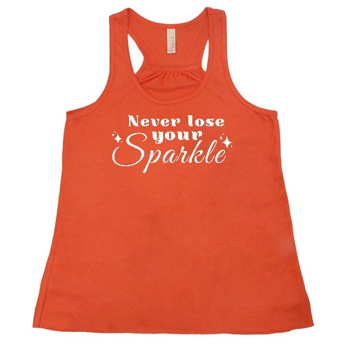coral racerback shirt with the saying "Never Lose Your Sparkle" on it