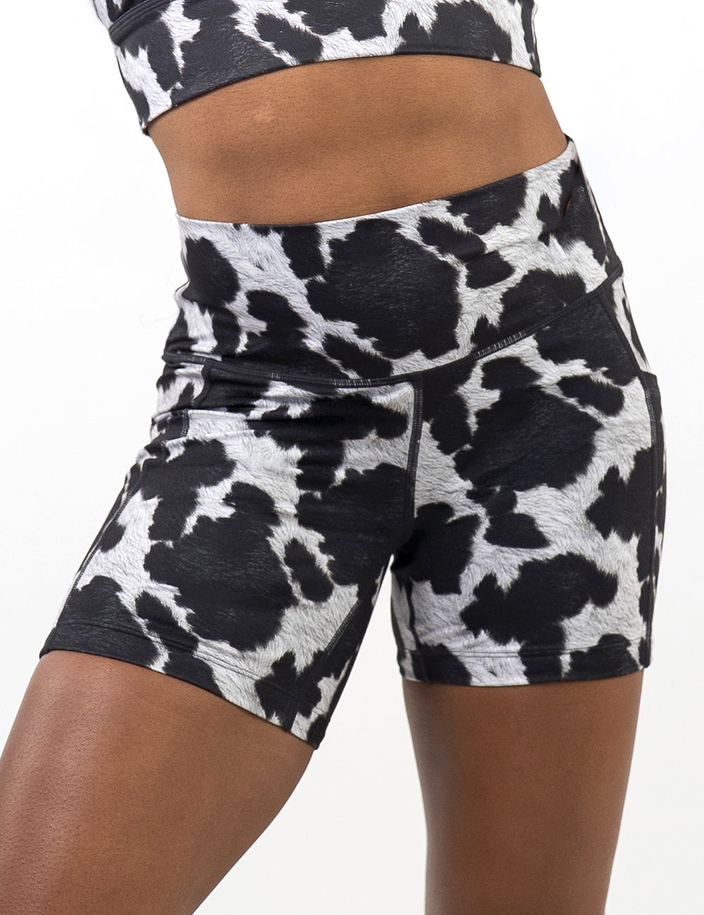 front of the 5 inch cow print shorts against a white background