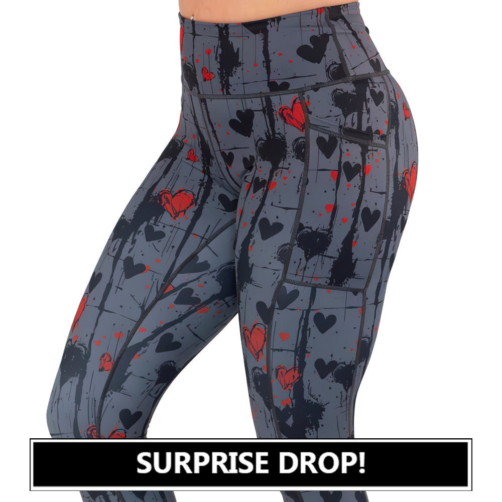 black and red heart patterned leggings