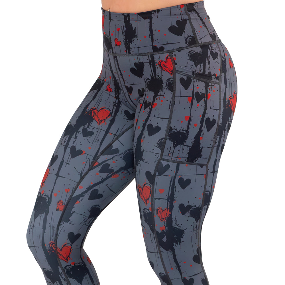 black and red heart patterned leggings