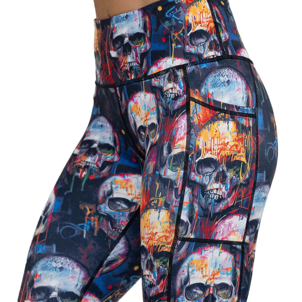 close up of skull paint splatter leggings