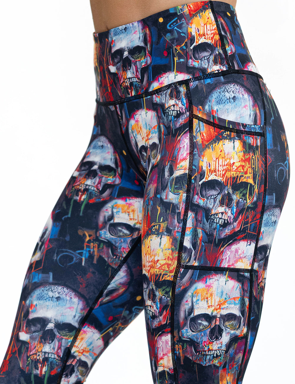 close up of skull paint splatter leggings