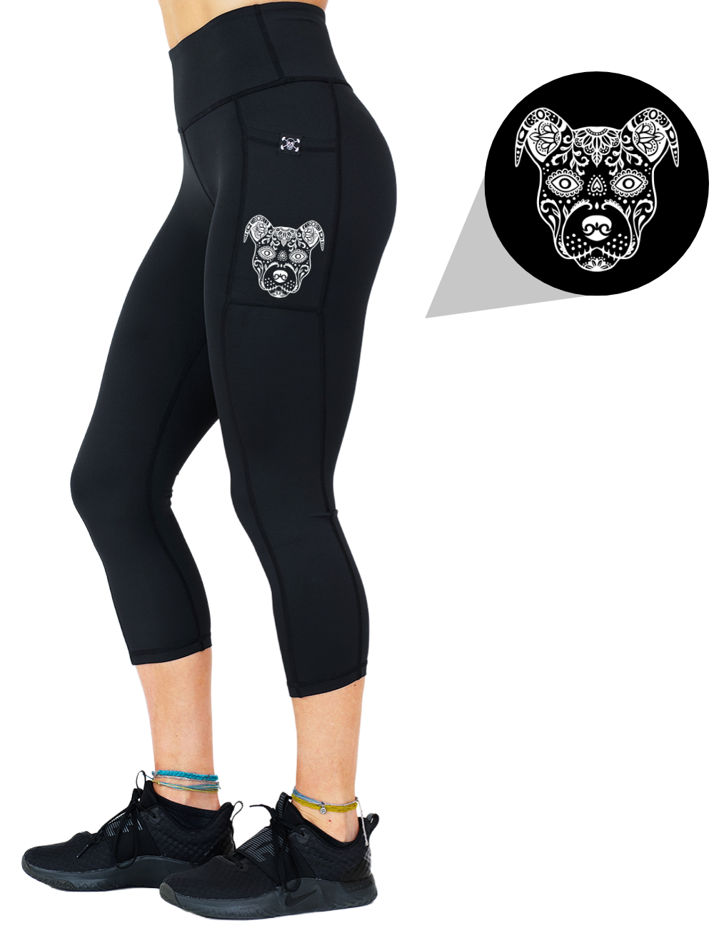 model wearing the dog outline graphic capri solid black leggings against a white background