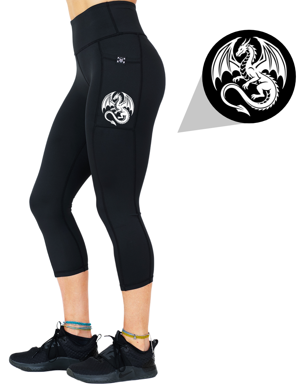 model wearing the dragon graphic capri solid black leggings against a white background