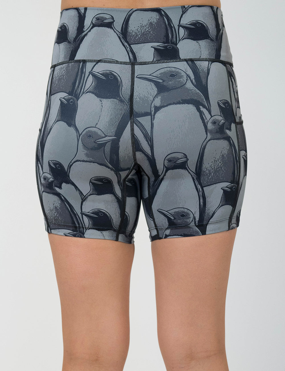 back of the 5 inch penguin patterned shorts against a white background