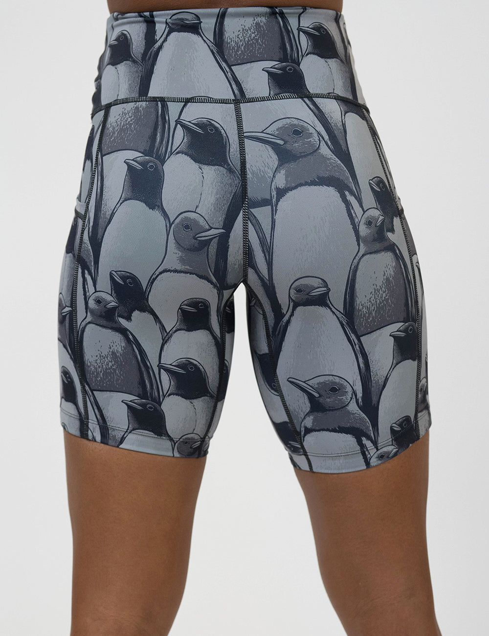 back of the 7 inch penguin patterned shorts against a white background