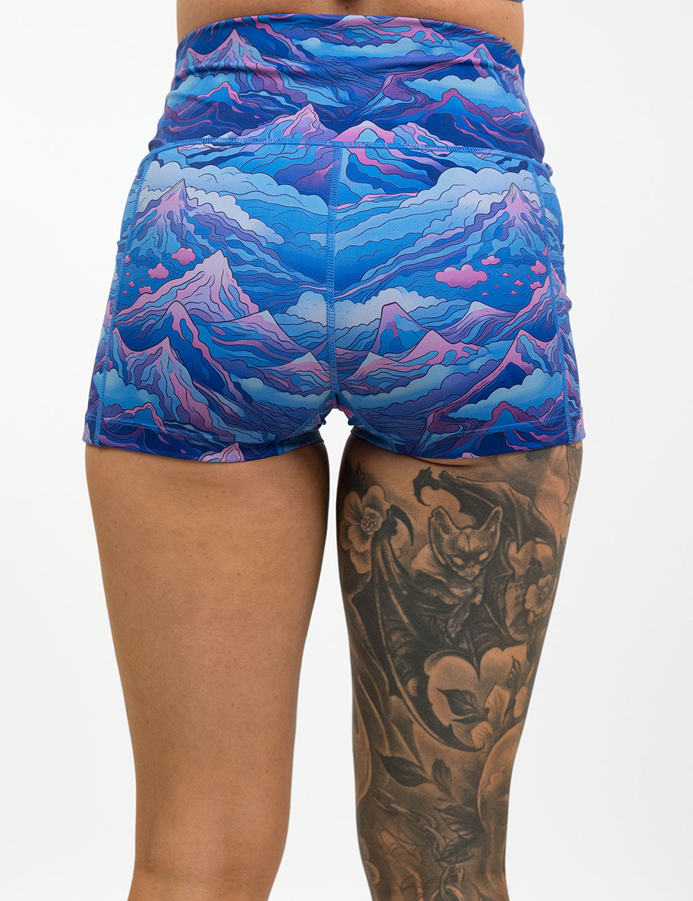 back of the 2.5 inch blue and pink mountains shorts against a white background
