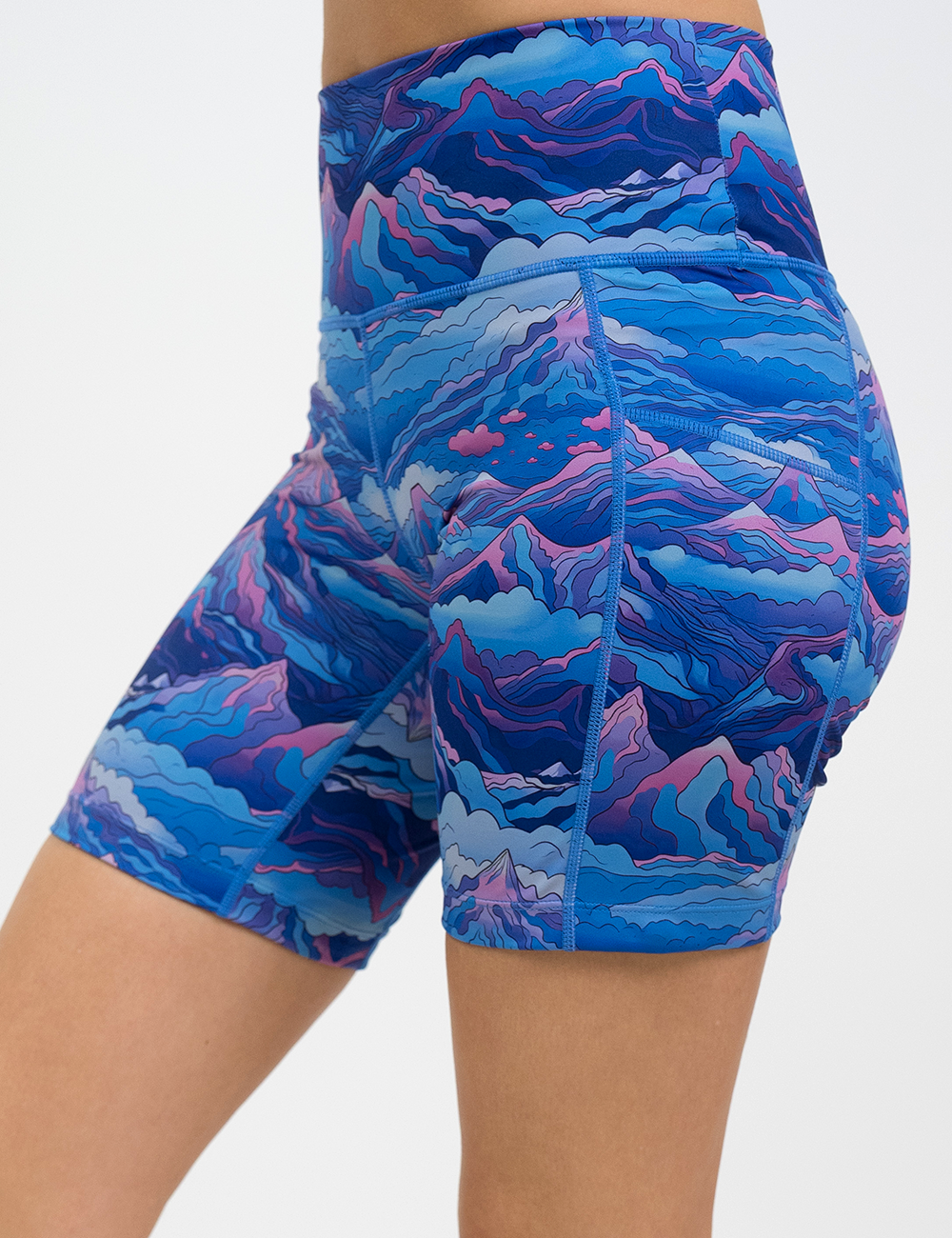 front of the blue and pink mountains shorts against a white background