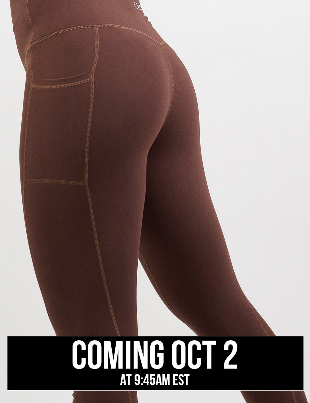back of the solid light brown leggings against a white background, coming October 2nd