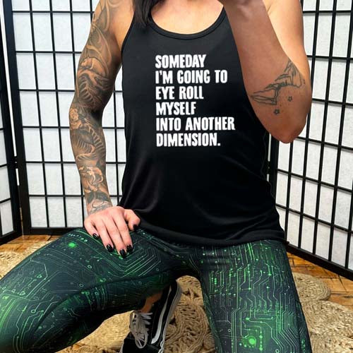 model wearing a black tank top that reads "someday I'm going to eye roll myself into another dimension."