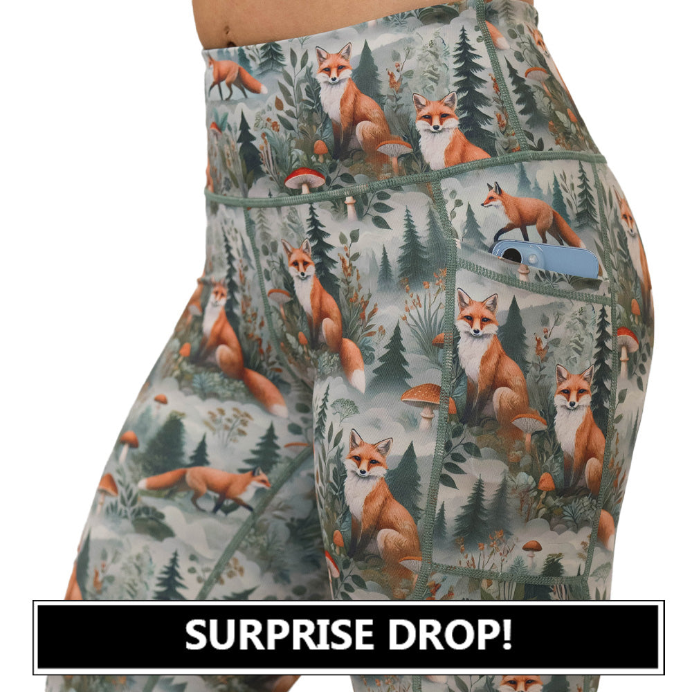 High-waisted leggings with fox and forest pattern on them