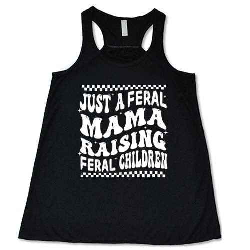 black racerback tank with the saying "just a feral mama raising feral children" on it