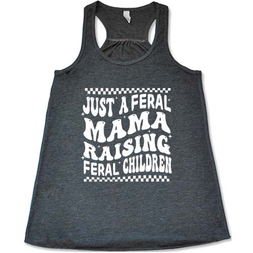 grey racerback tank with the saying "just a feral mama raising feral children" on it