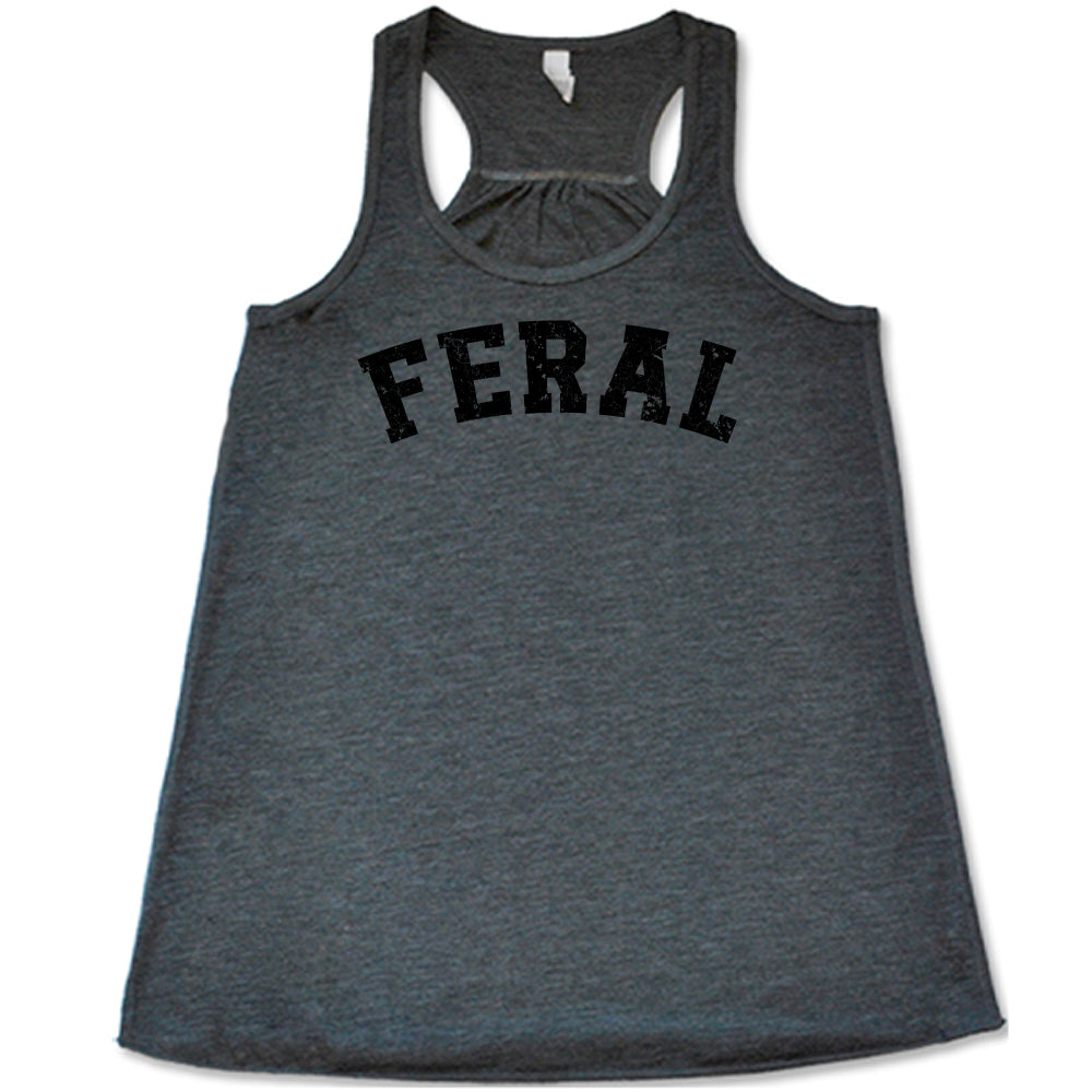 grey shirt with the word "feral" in the middle of it