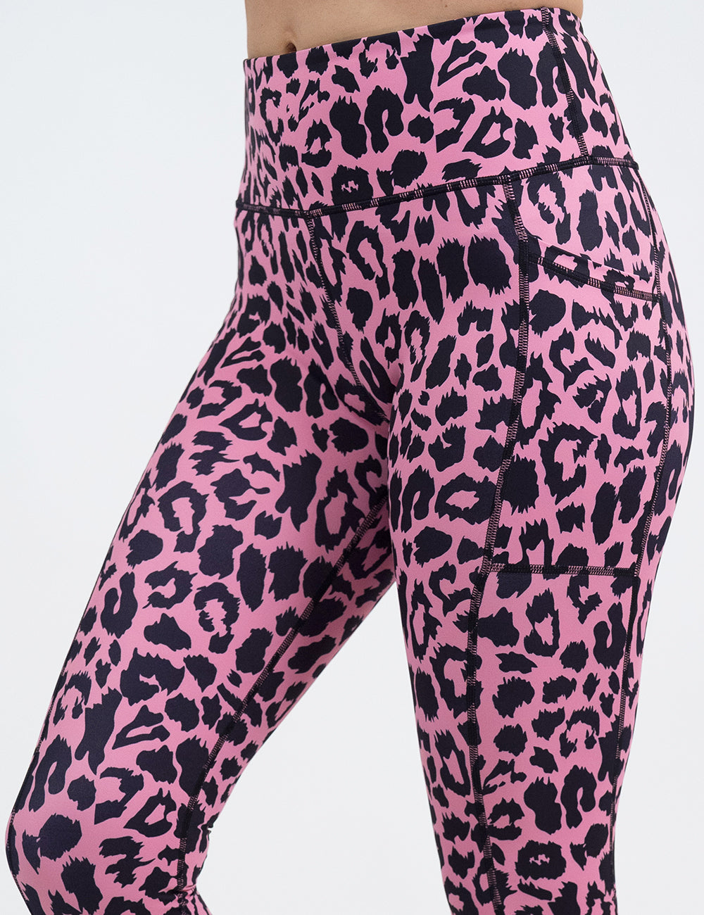 close up of pink leopard print leggings facing the front against a white background