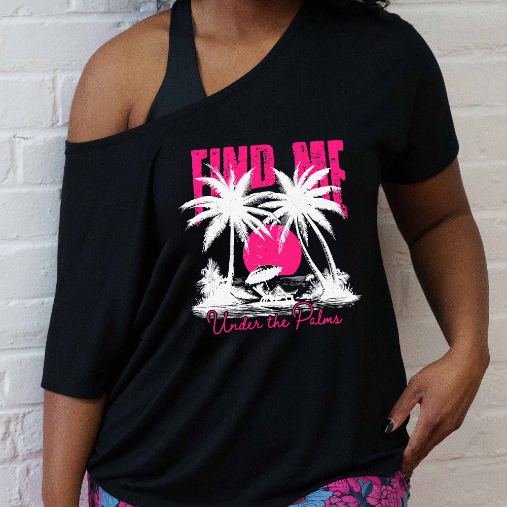 shirt with a beach and palm trees graphic on it that says "Find Me Under The Palms"
