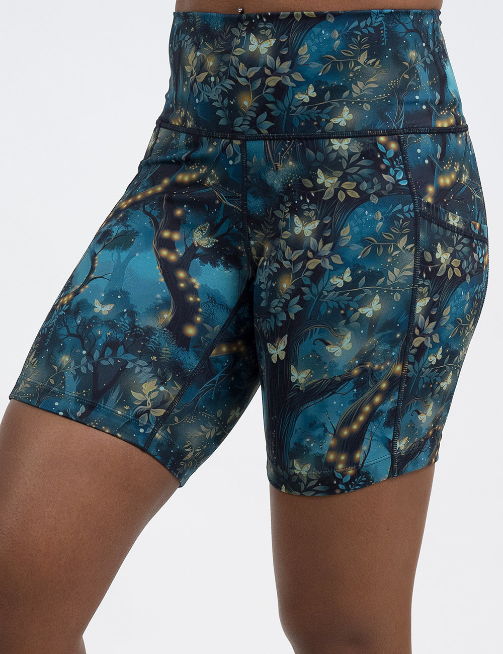 front of the forest filled with firefly's pattern 7 inch shorts against a white background