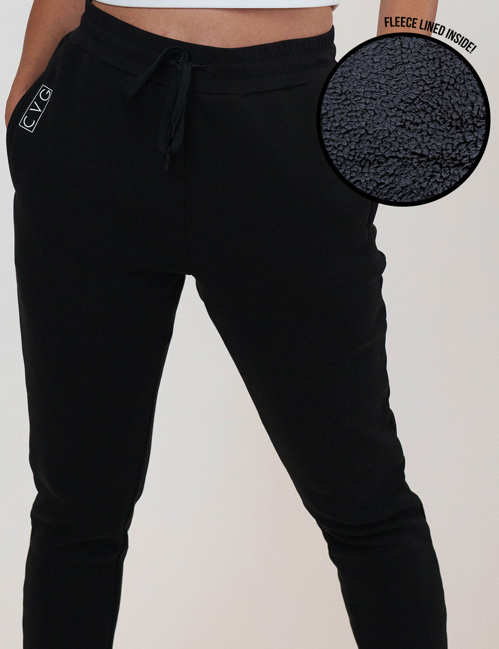 Black fleece-lined jogger pants with a close-up of the lining on a white background.