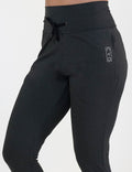 dark grey joggers against a white background