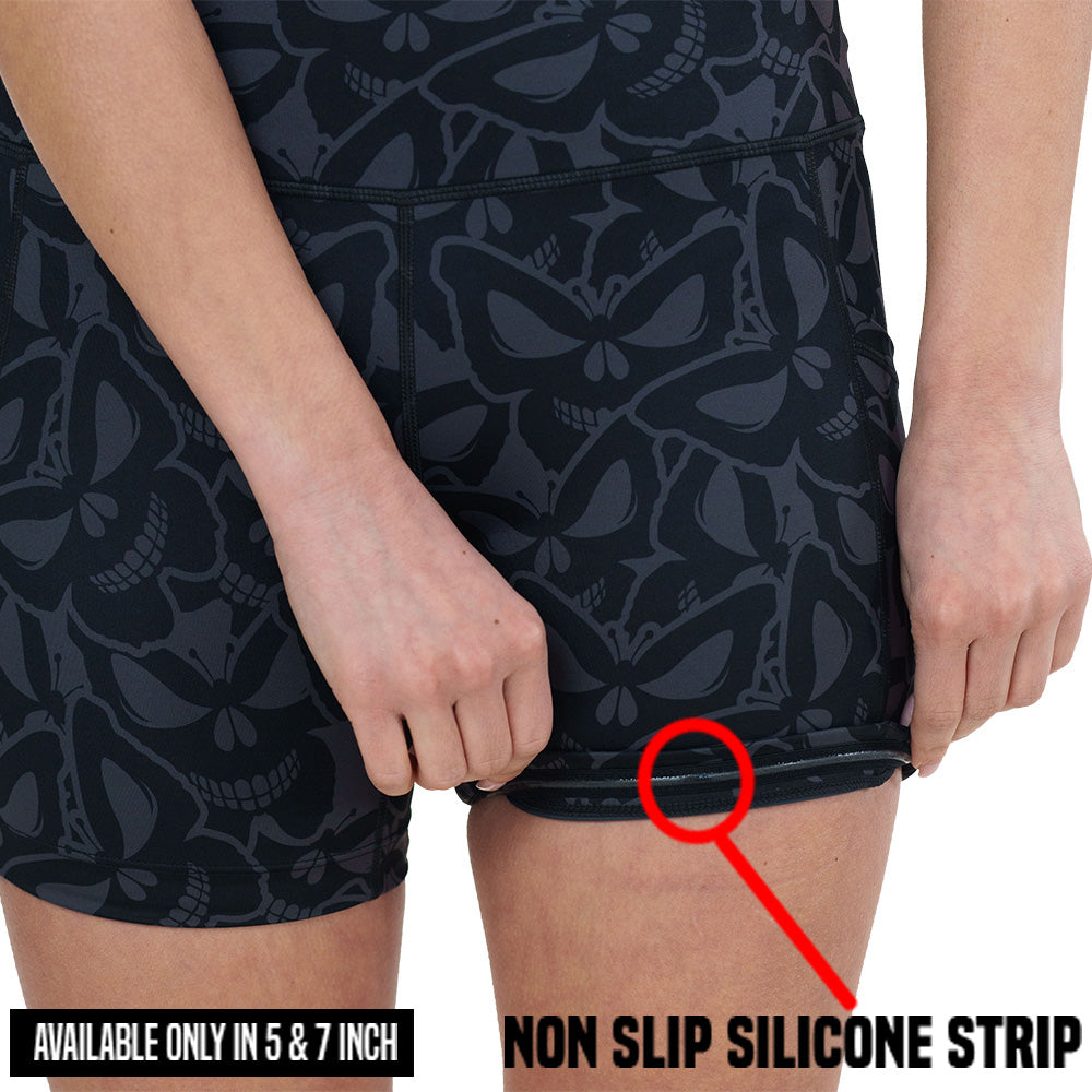 non slip strip on the grey and black butterfly shaped skulls patterned shorts