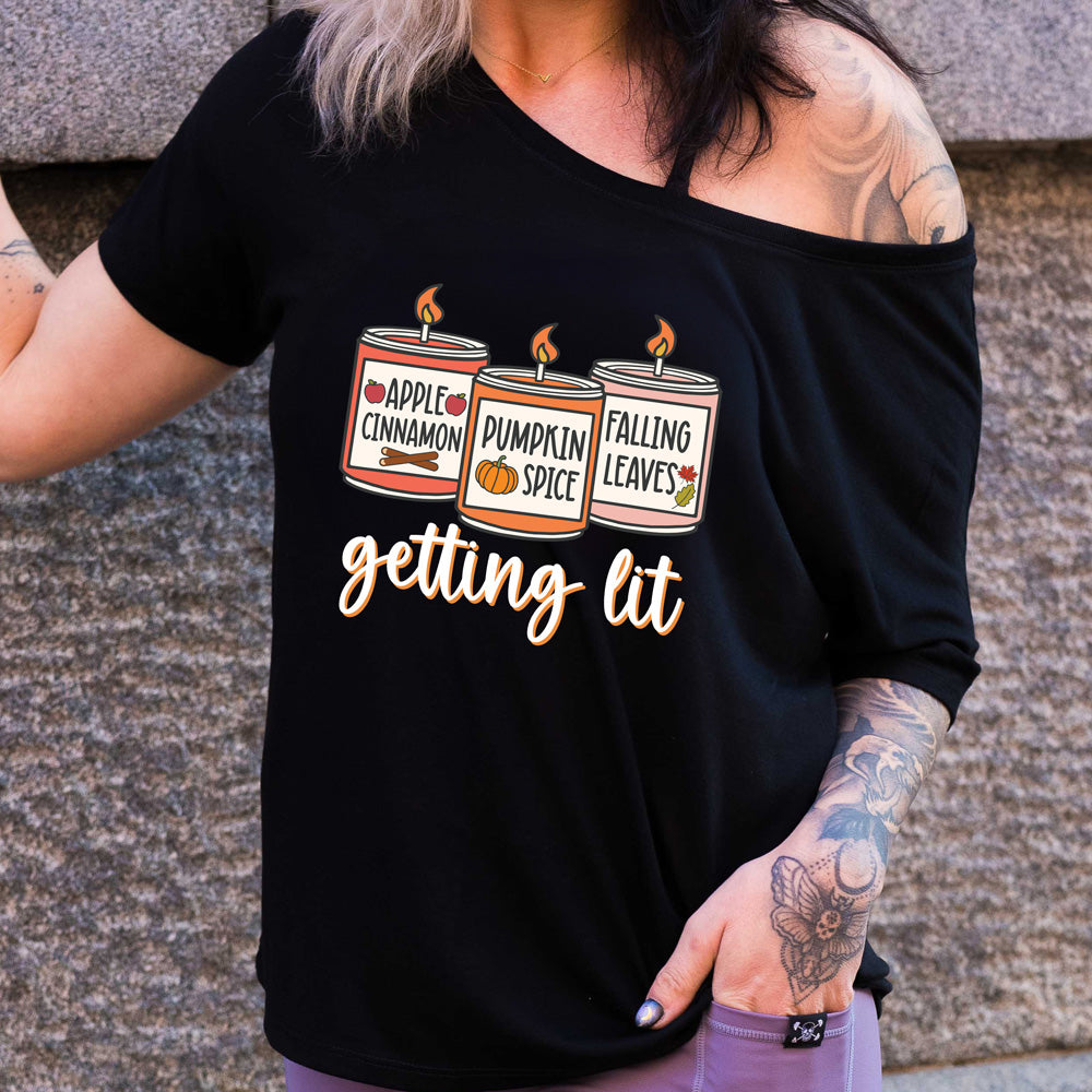 shirt with fall scented candles graphic on it that says "getting lit"