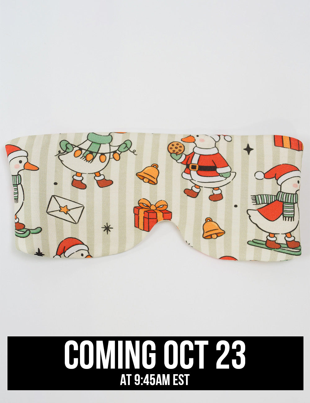 front of the ducks with santa hats surrounded by presents striped eye mask coming October 23
