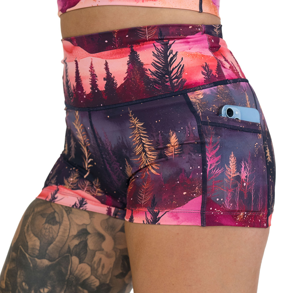 shorts with forest design and red ombre sky