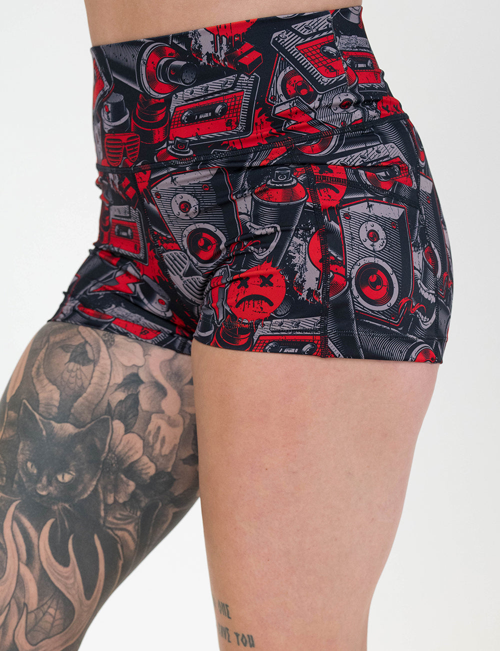 front of the 2.5 inch graffiti patterned shorts against a white background