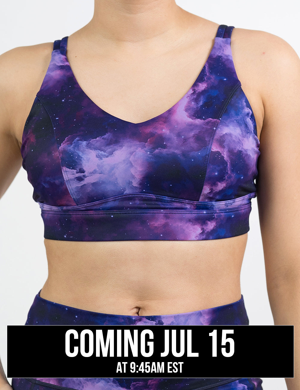 front of the purple space pattern vitality bra against a white background, coming july 15th