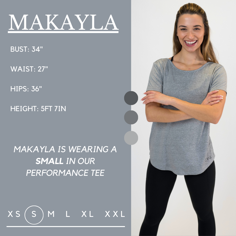 Model’s measurements of 34” bust, 27” waist, 36” hips and height of 5 ft 7 in. She is wearing a size small in our performance tee